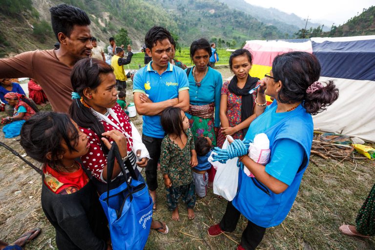 Unicef worker Anita Dahal provides sanitation and hygiene supplies to people affected by the earthquakes in Nepal. Photo: Unicef/2015/Zammit
