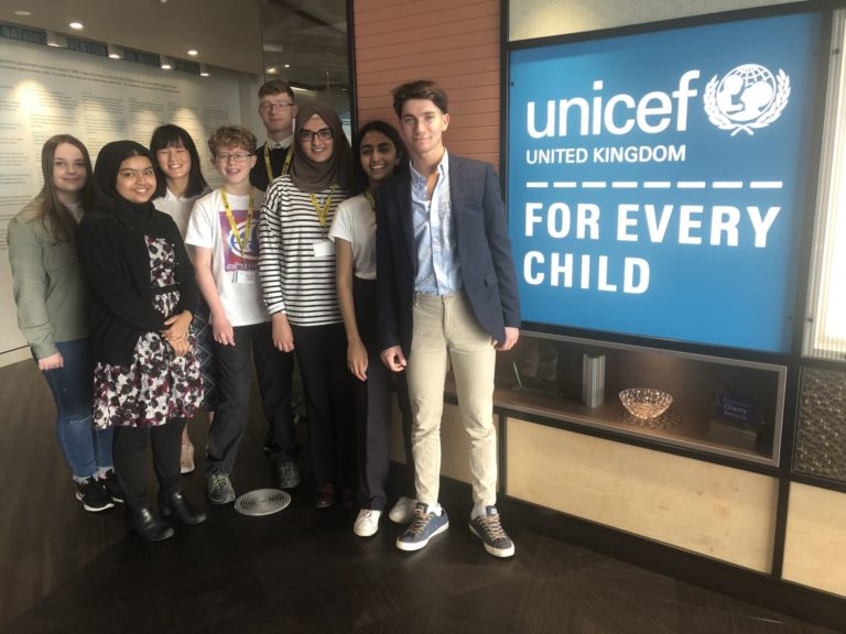 Eddie - third from left, and Maham - third from right, are members of Unicef UK's Youth Advisory Board